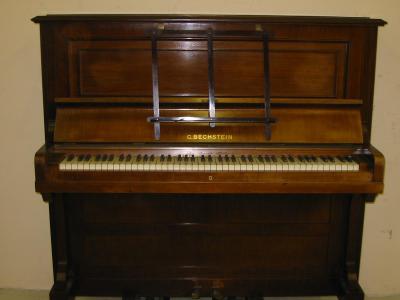 Appraisal: A BECHSTEIN UPRIGHT PIANO early th century the iron frame