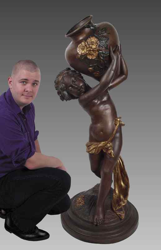 Appraisal: LARGE AFTER MOREAU BRONZE BOY HOLDING WATER VESSEL After Moreau