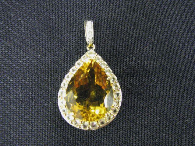 Appraisal: Citrine Pendant fine fiery pear shaped gem surrounded by white