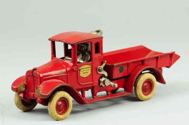 Appraisal: IH RED BABY DUMP TRUCK Arcade cast iron painted in