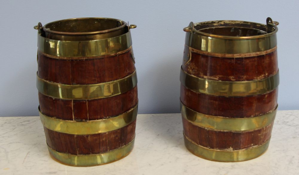 Appraisal: Pair Of Antique Brass Mounted Barrel Form Coolers From a