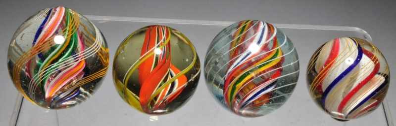 Appraisal: Lot of Swirl Marbles Description Includes three divided core swirls