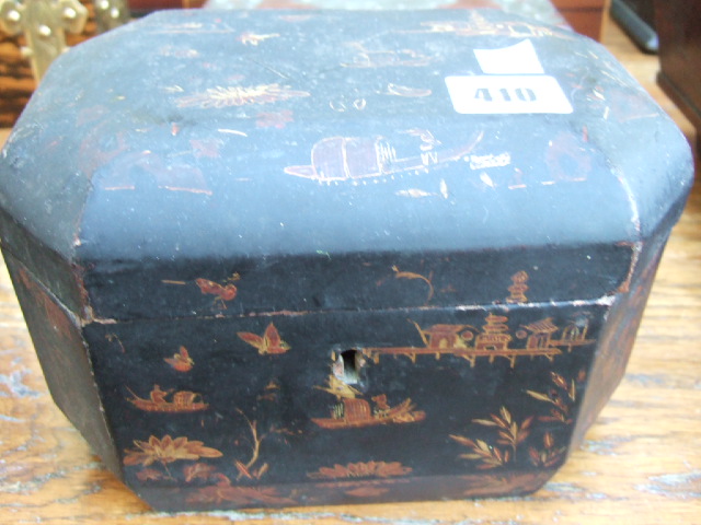 Appraisal: A th century black lacquer tea caddy of compressed octagonal