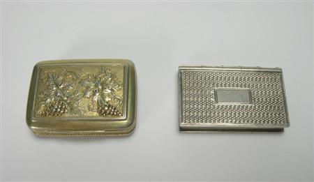 Appraisal: A George III silver-gilt vinaigrette and a book shaped vinaigrette