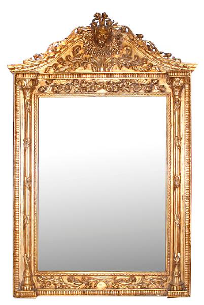 Appraisal: A large Neoclassical style carved and gilt decorated mirror with