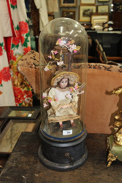 Appraisal: AN EARLY TH CENTURY GERMAN AUTOMATA DEPICTING MISS MUFFET being