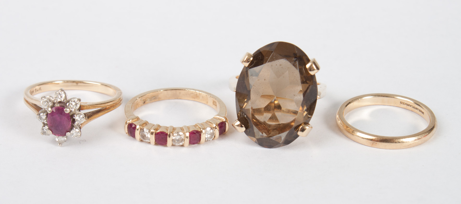 Appraisal: Four lady's K gold and colored stone rings comprising two