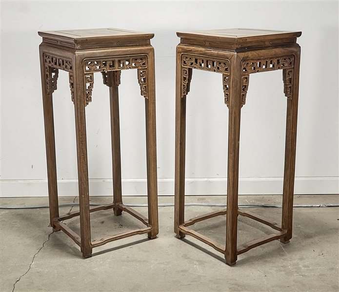 Appraisal: Pair of Chinese wood stands with openwork apron design x