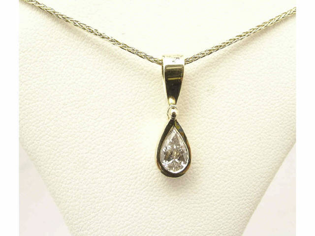 Appraisal: Pear-shaped diamond pendant approximately ct in K gold setting on