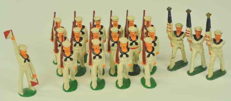 Appraisal: GROUPING OF HOLLOW CAST SOLDIER FIGURES Contemporary naval lot includes