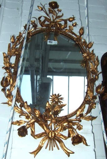 Appraisal: A pair of th century gilt metal wall mirrors with