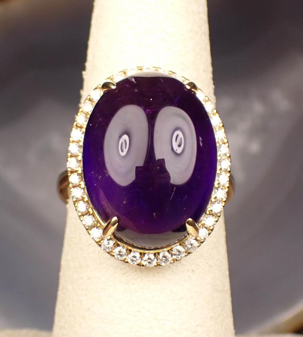 Appraisal: AMETHYST DIAMOND AND FOURTEEN KARAT GOLD RING The yellow gold