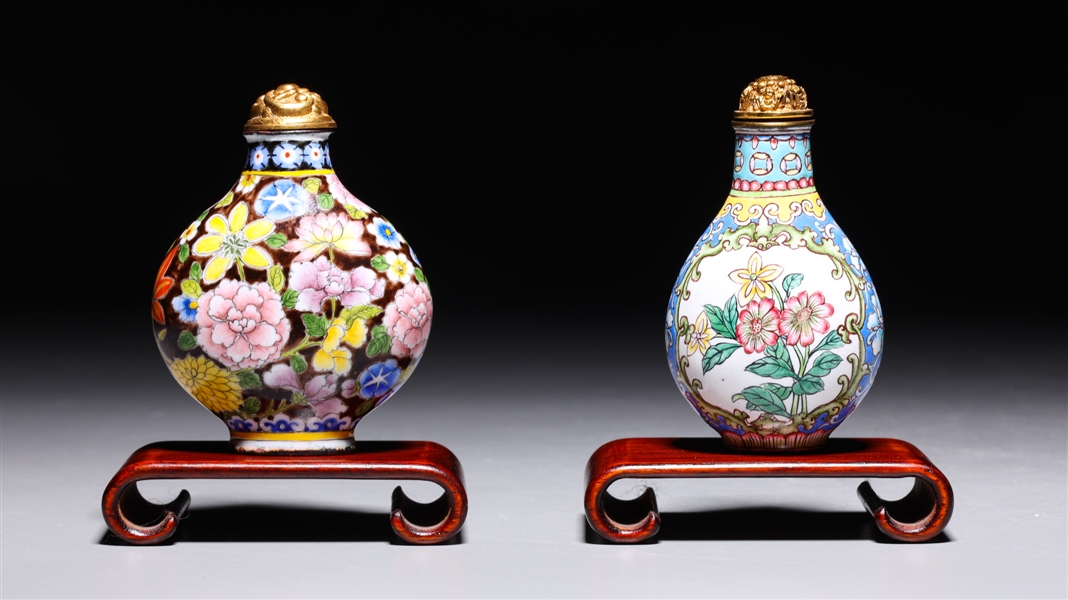 Appraisal: Two Chinese enamel on copper snuff bottles each with floral