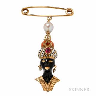 Appraisal: kt Gold Enamel and Coral Blackamoor Charm Cartier with gem-set