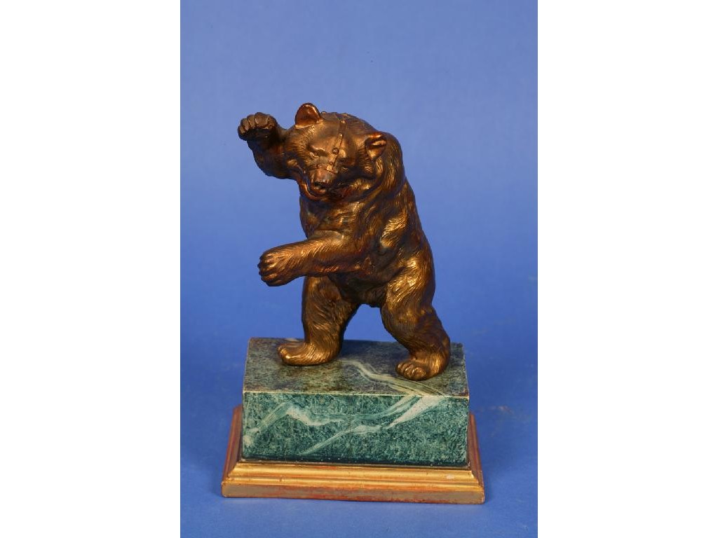 Appraisal: A RUSSIAN STYLE GILT METAL BEAR on a simulated green