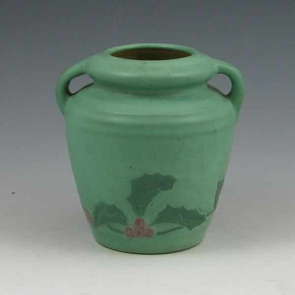 Appraisal: Weller handled vase in matte green with holly decoration Marked