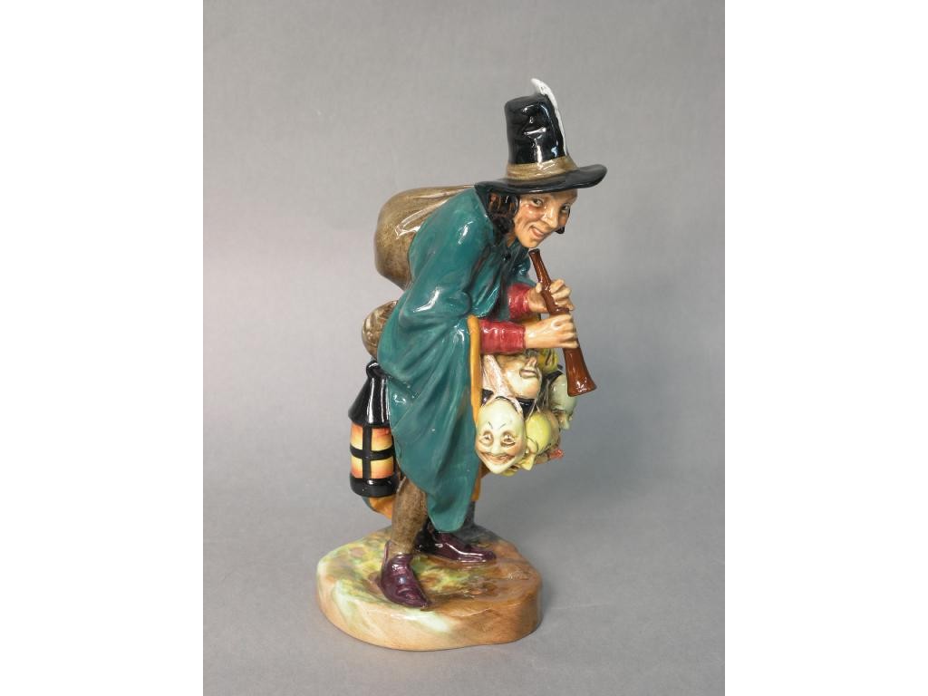 Appraisal: A Royal Doulton figure 'The Mask Seller' HN -