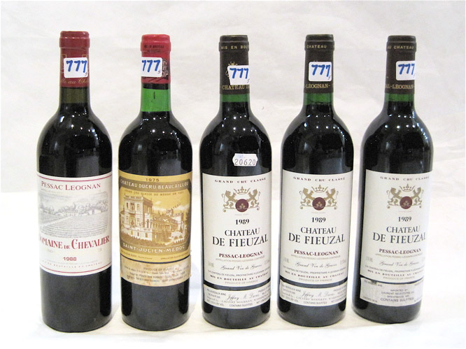 Appraisal: FIVE BOTTLES OF VINTAGE FRENCH RED BORDEAUX WINE Chateau DeFieuzal