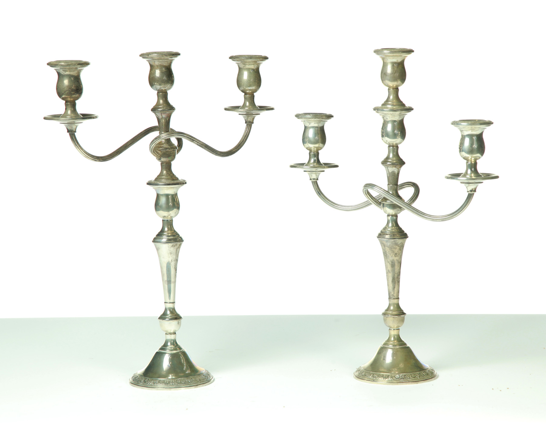 Appraisal: PAIR OF INTERNATIONAL WEIGHTED STERLING SILVER CANDELABRAS IN THE PRELUDE