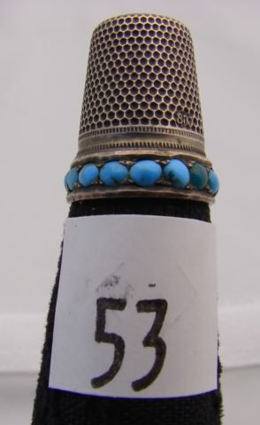 Appraisal: Silver thimble with blue stones on band