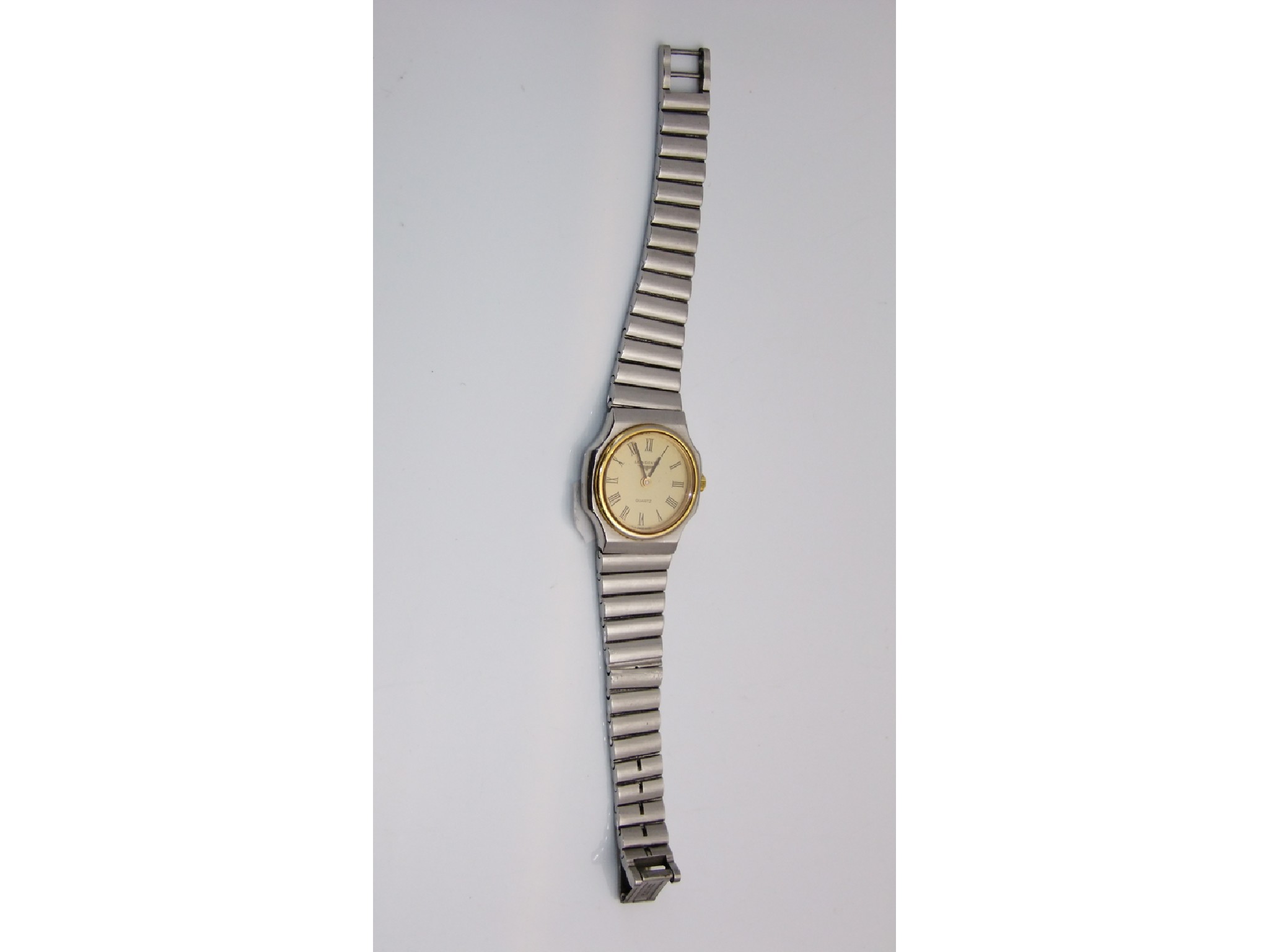 Appraisal: A lady's two-tone stainless steel wristwatch Longines the gilt dial