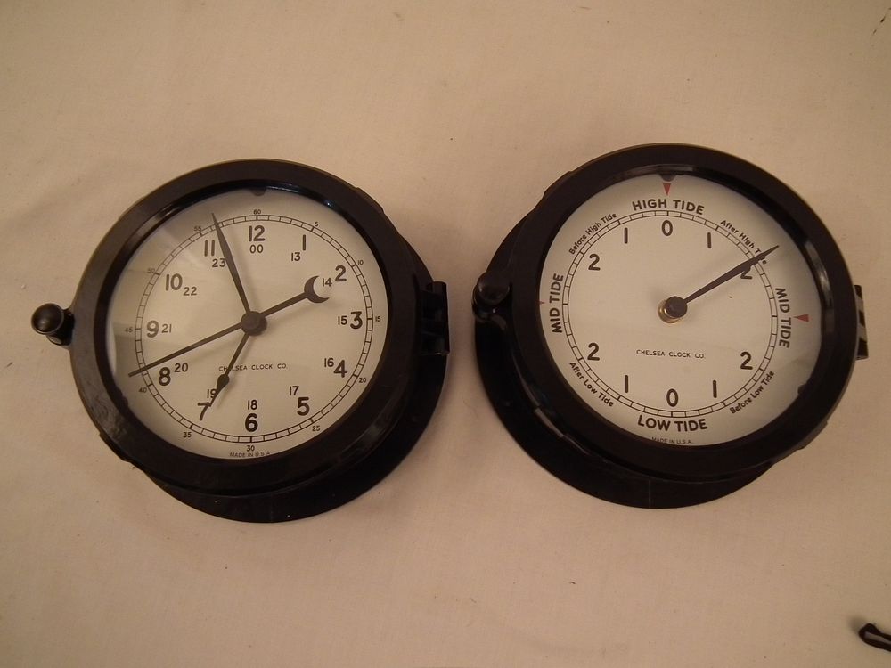 Appraisal: PAIR CHELSEA SHIP CLOCKS Pair of modern Chelsea black resin