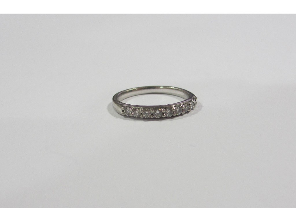 Appraisal: Platinum diamond stone half hoop ring with brilliant cut diamonds