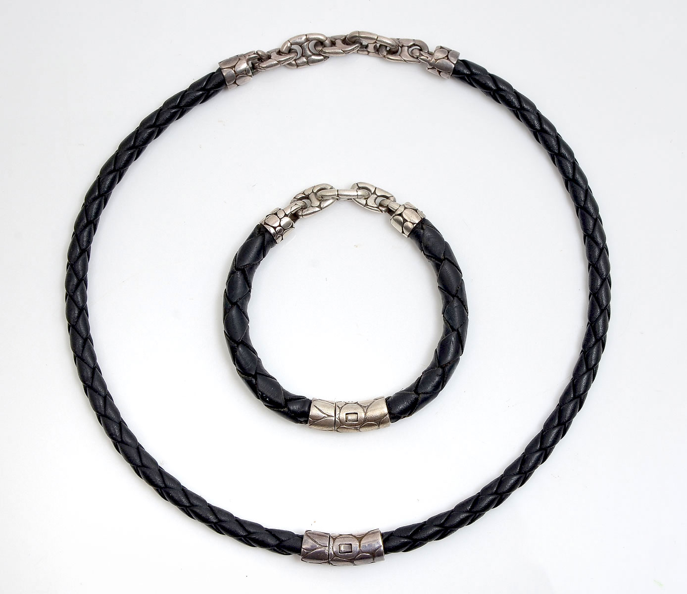 Appraisal: JOHN HARDY LEATHER STERLING NECKLACE BRACELET Matching chain braided leather