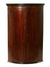 Appraisal: WALL HANGING CORNER CUPBOARD - Mahogany Barrel Front Corner Cupboard