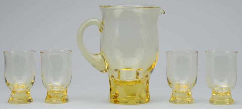 Appraisal: Singed Moser Pitcher with Tumblers Description Quite heavy crystal Condition