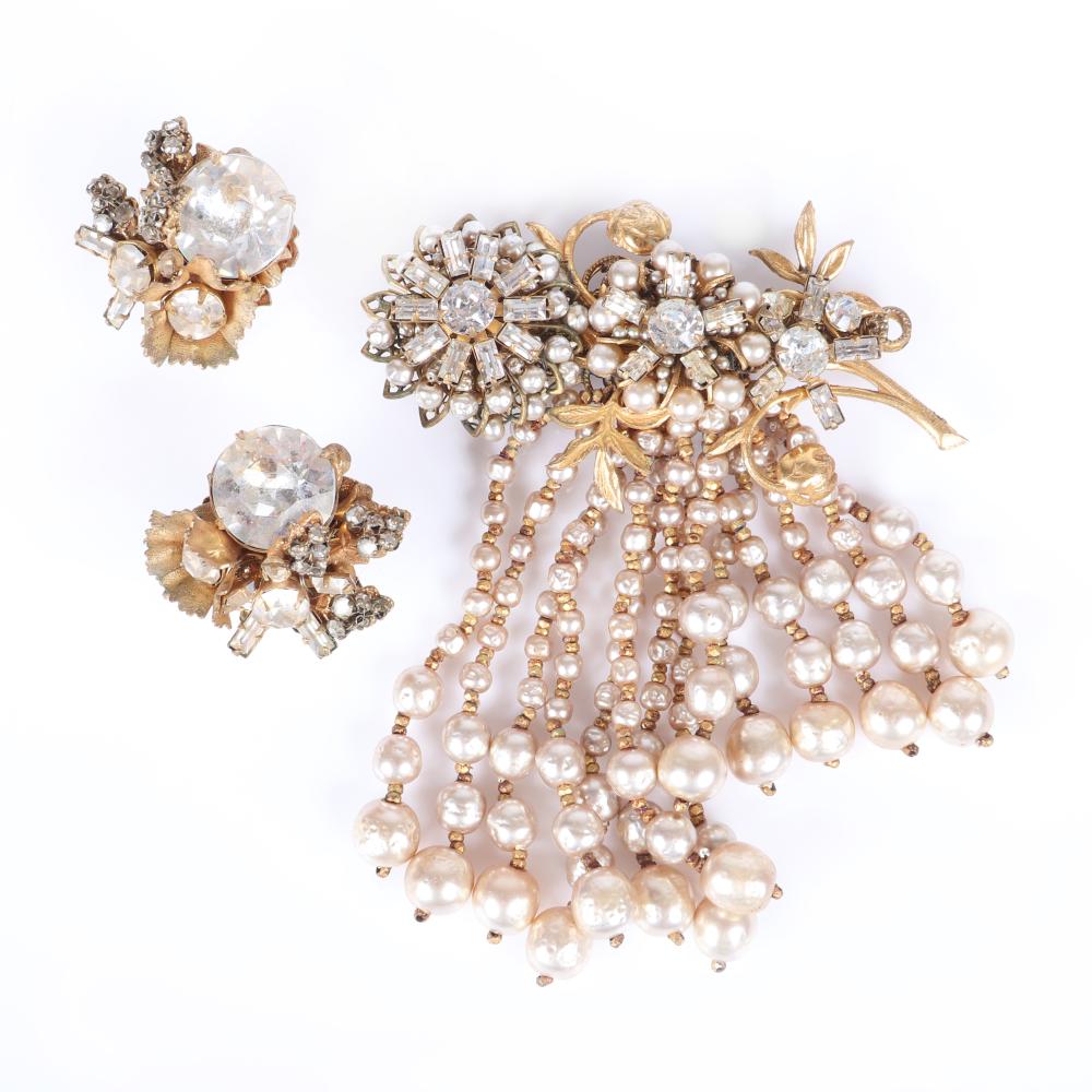 Appraisal: MIRIAM HASKELL FLOWER SPRAY BROOCH WITH RHINESTONES BAGUETTES AND CASCADING