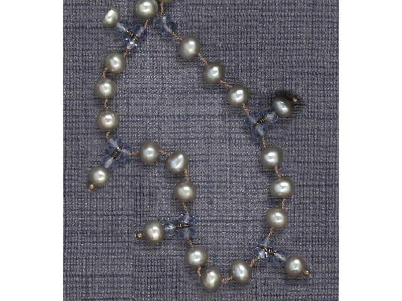 Appraisal: PEARL NECKLACE Silver pearls and dangling blue beads Estimate -