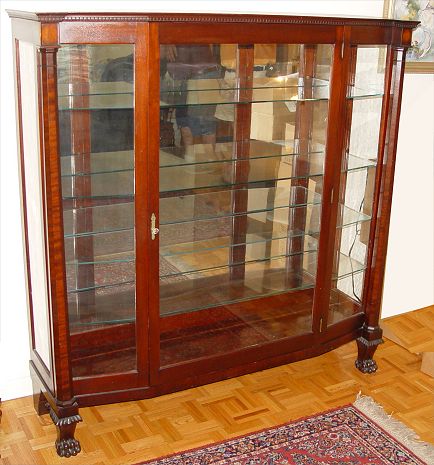 Appraisal: CARVED MAHOGANY BOOKCASE DISPLAY CABINET Late th - early th