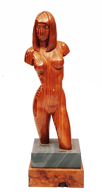 Appraisal: A th Century wood carving of a naked girlon a