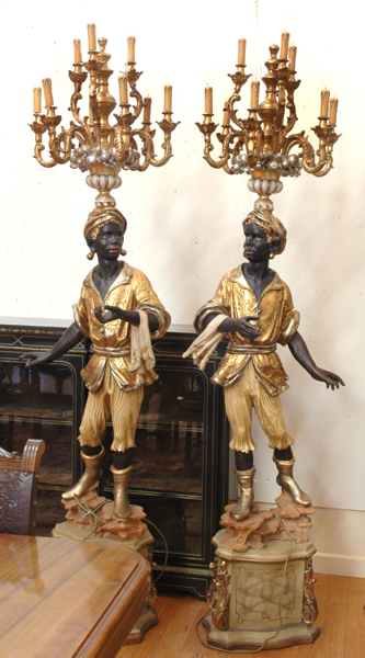 Appraisal: A PAIR OF VENETIAN STYLE GILT WOOD AND POLYCHROME BLACKAMOOR