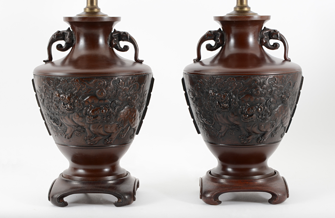 Appraisal: PR CHINESE ROARING LION BRONZE LAMPS Deeply embossed and highly