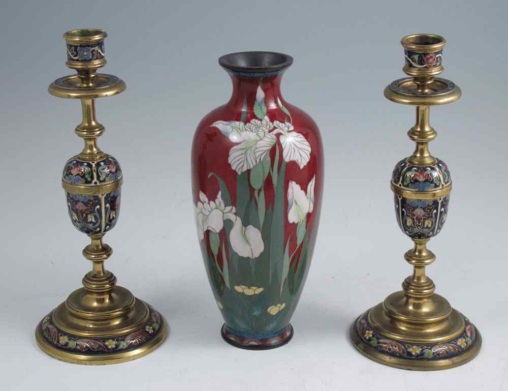 Appraisal: CLOISONNE VASE AND PAIR OF CHAMPLEVE CANDLESTICKS To include Cloisonne