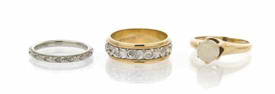 Appraisal: A Group of Karat Gold Rings consisting of two engraved