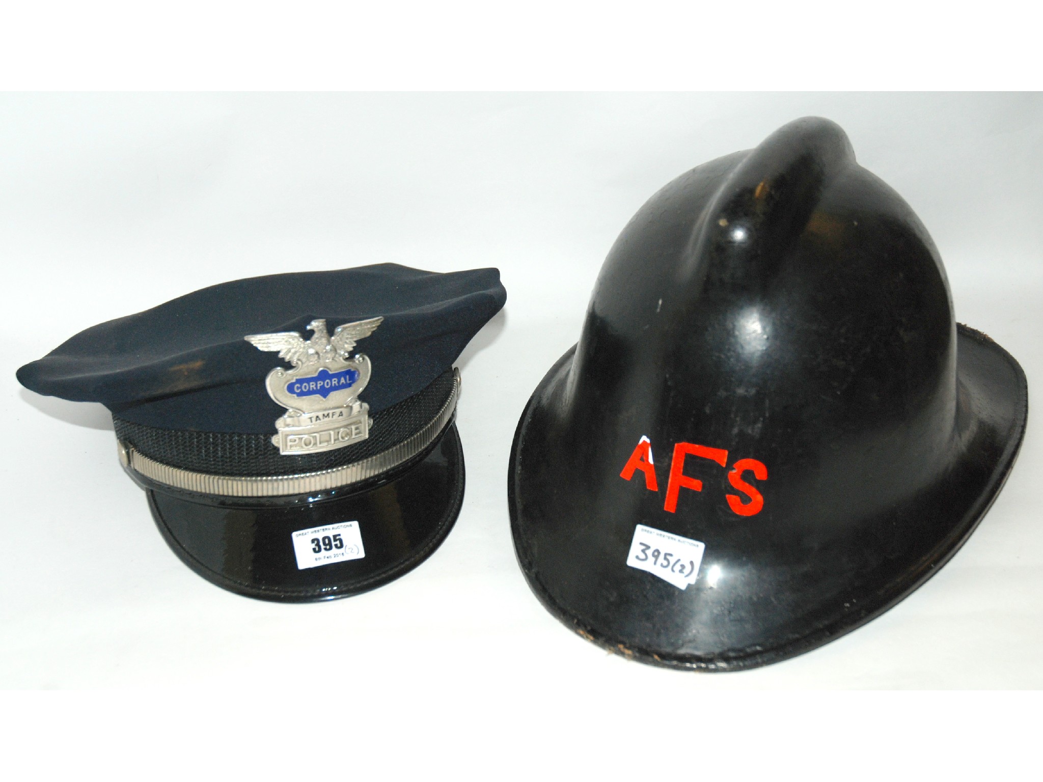 Appraisal: A Tampa Police hat and a Fireman helmet