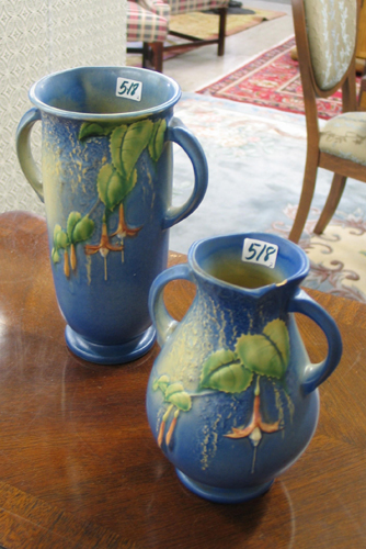 Appraisal: TWO ROSEVILLE BLUE FUCHSIA ART POTTERY VASES The larger with