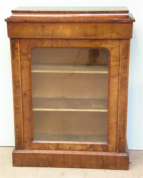 Appraisal: th century walnut and crossbanded pier cabinet with a glazed