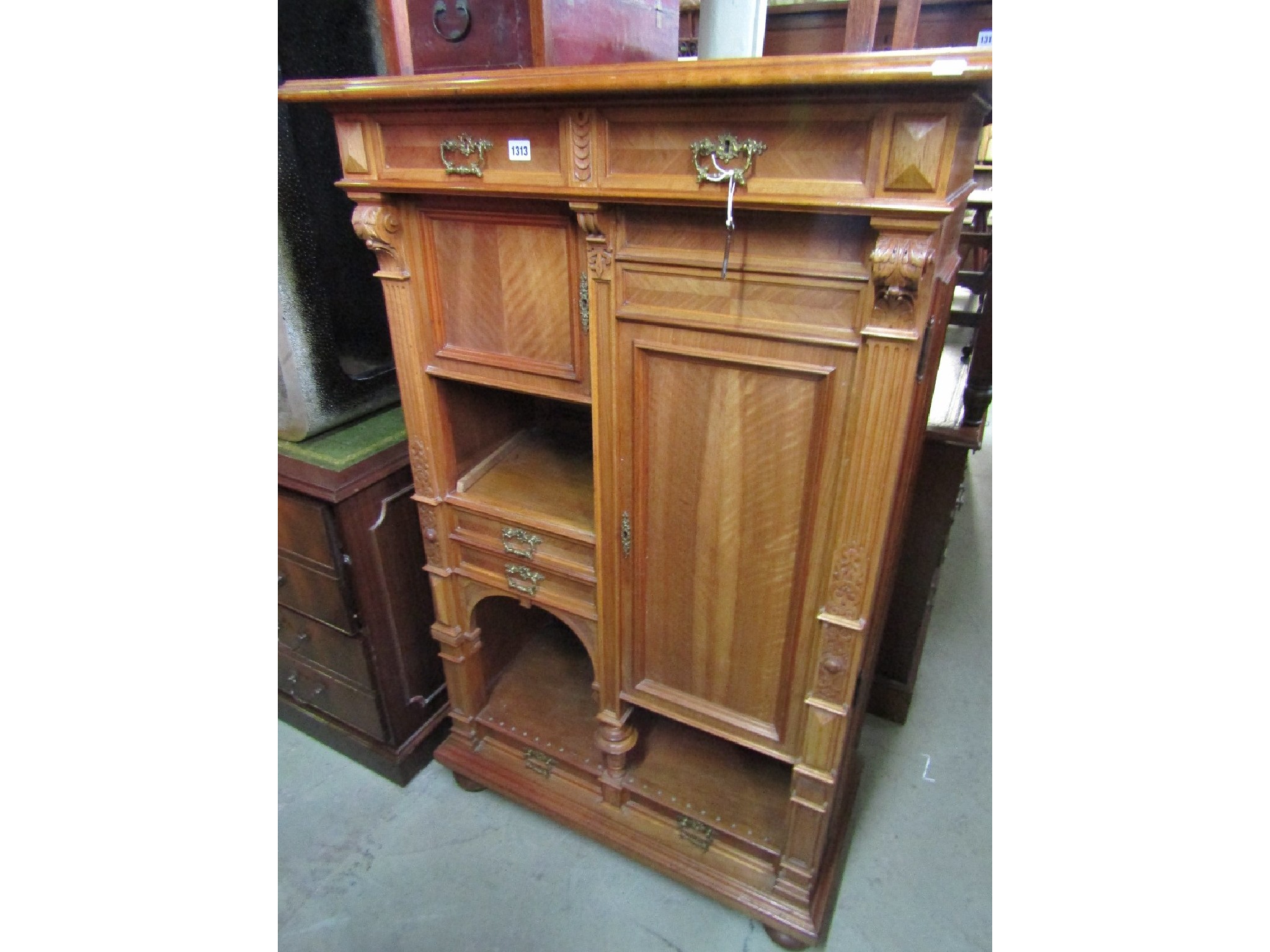 Appraisal: A th century continental walnut freestanding side cupboard with well