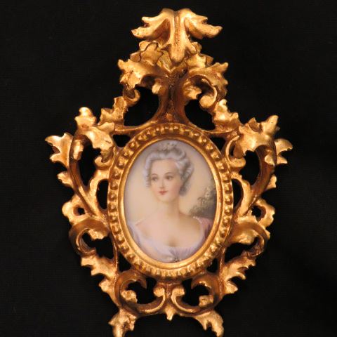 Appraisal: Miniature Painting on Ivory of Young Lady in ornate carved