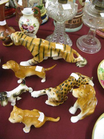 Appraisal: Royal Dux Porcelain Animal figurines tiger leopard and various dogs