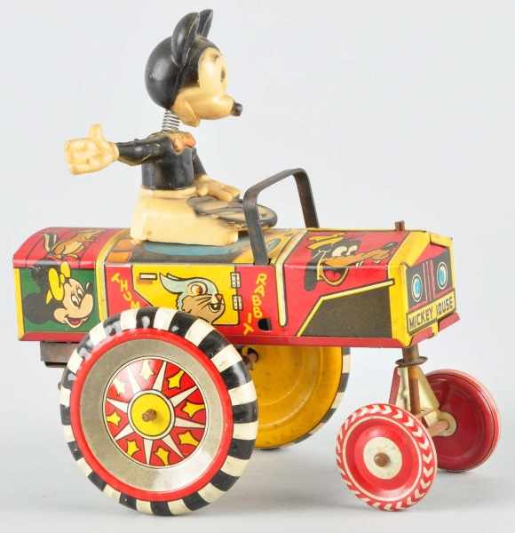 Appraisal: Tin Marx Disney Mickey Mouse Dipsy Car Toy Description American