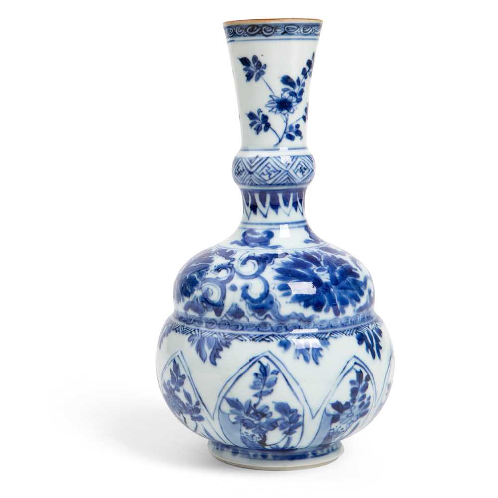 Appraisal: BLUE AND WHITE MOULDED BOTTLE VASE KANGXI PERIOD the slightly