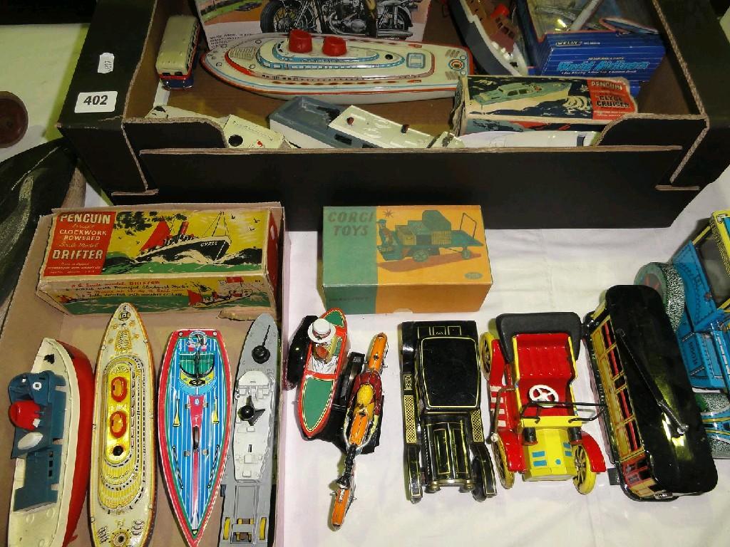 Appraisal: An interesting collection of clockwork toy boats including a Sutcliffe