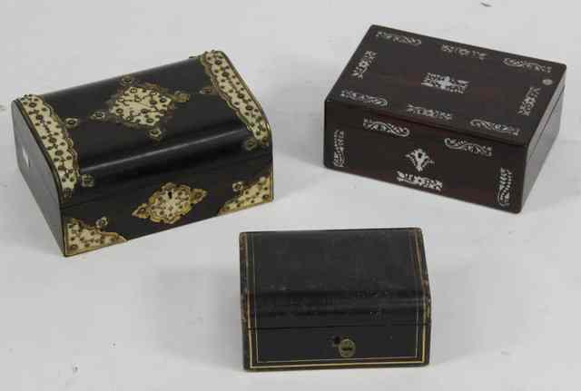 Appraisal: A Victorian rosewood and mother-of-pearl inlaid box cm wide a