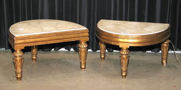 Appraisal: A pair of Neoclassical style giltwood demilune low console tables