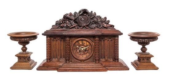 Appraisal: Sale Lot A Continental Carved Oak Three-Piece Clock Garniture comprising